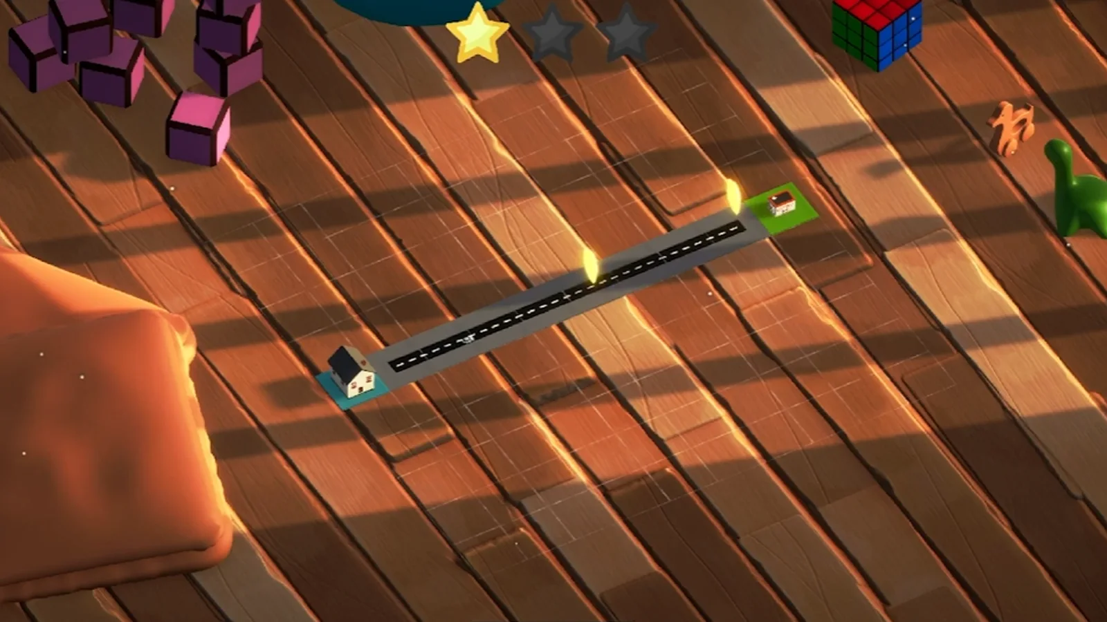 A drawn road leading the toy car across a wooden floor