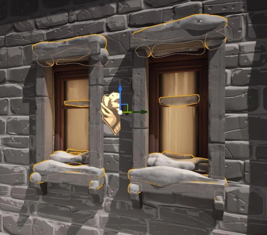 Generated snow meshes selected around the tops and ledges of two stone windows